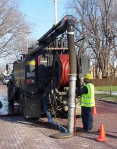 Sewer Cleaning on a brick road