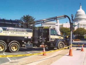 Sewer cleaning outside of the Capitol building