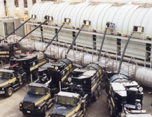 fleet of wet/dry vacuum cleaning trucks